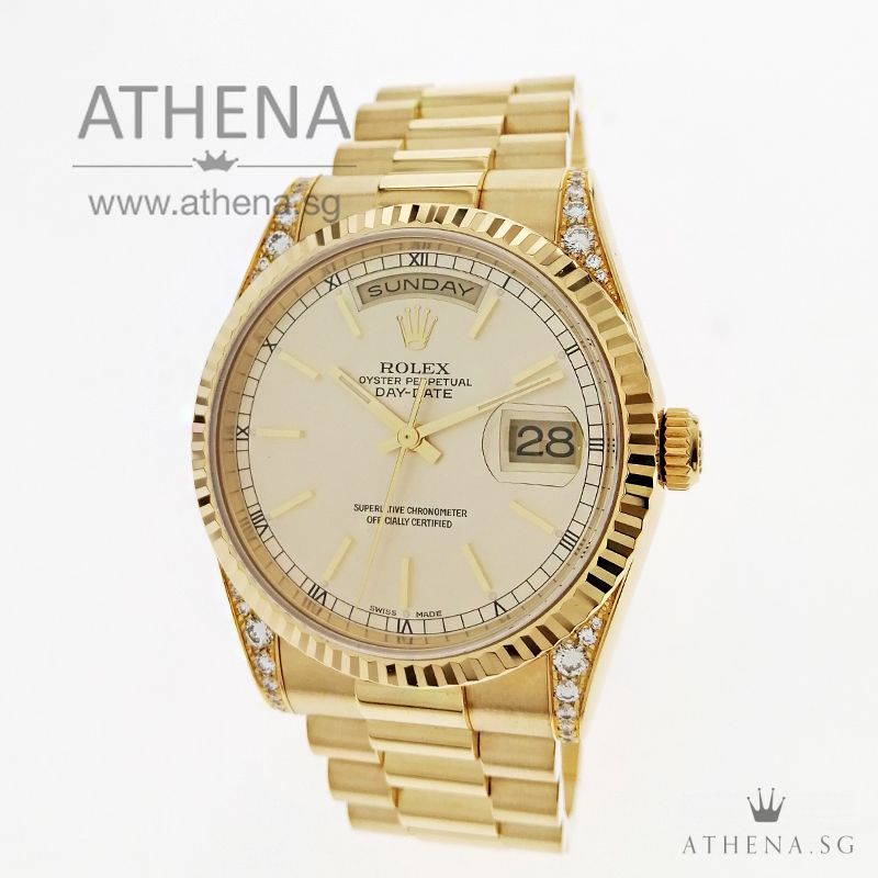 ROLEX 18K YELLOW GOLD OYSTER PERPETUAL DAY-DATE "K" SERIES "CHAMPAGNE INDEX DIAL" WITH ORIGINAL FACTORY SETTING DIAMOND ON LUGS, BOX & CERT 118338