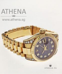 Alternative view of ROLEX 18K YELLOW GOLD ROLEX LADIES DATEJUST "Z" SERIES "RED SODALITE DIAMOND DIAL" WITH ORINGIAL ROLEX DIAMOND SETTING ON THE LUGS, CHAPTER RING & CERT 179238 (LOCAL AD)