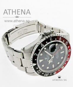 Alternative view of ROLEX OYSTER PERPETUAL DATE GMT MASTER II COKE "W" SERIES "BLACK TRITIUM DIAL" 16710
