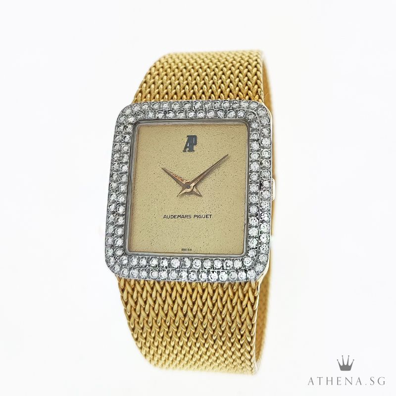 VINTAGE 18K YELLOW GOLD AUDEMARS PIGUET MANUAL WINDING "CHAMPAGNE DIAL" WITH CUSTOMIZE WHITE GOLD DIAMOND BEZEL